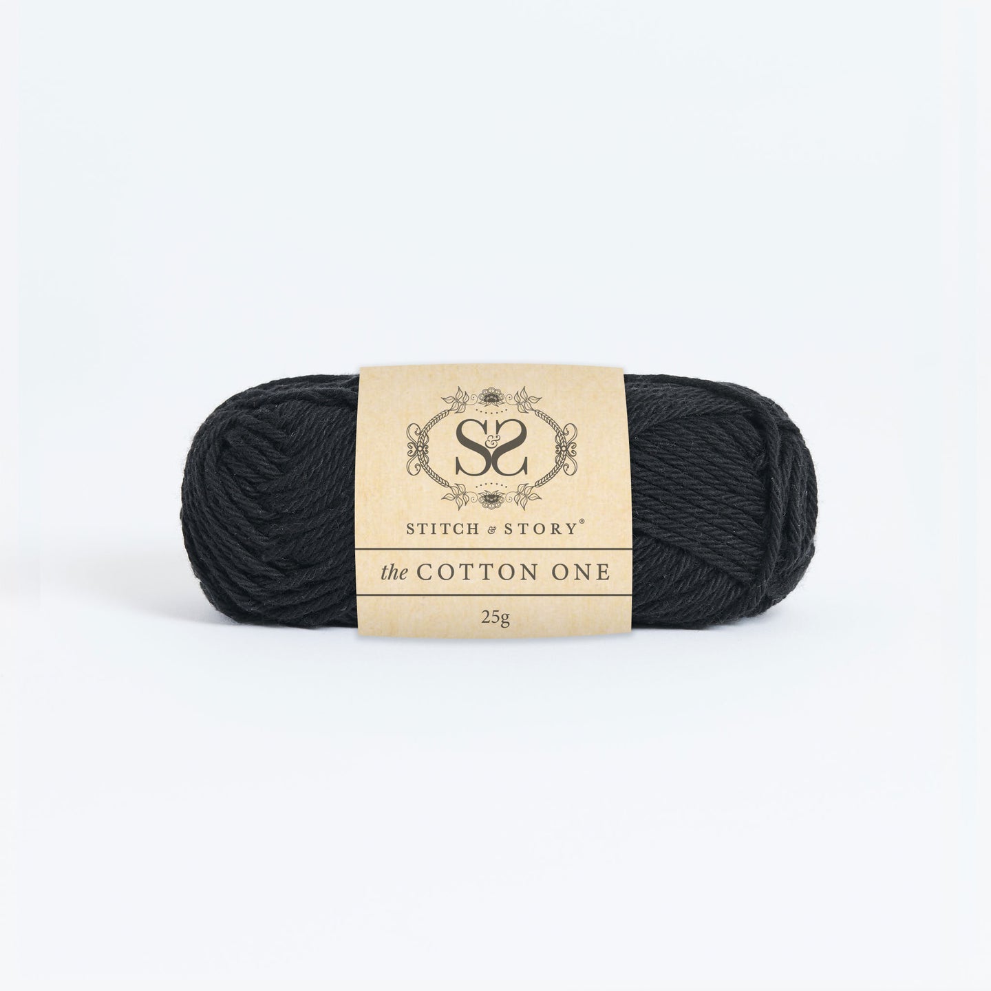 Front on photo of the Stitch & story's Cotton one yarn in 25g ball, in Obsidian Black