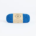 Front on photo of the Stitch & story's Cotton one yarn in 25g ball, in Royal Blue