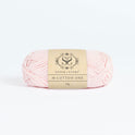 Front on photo of the Stitch & story's Cotton one yarn in 25g ball, in Baby Pink