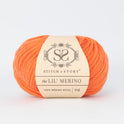Front on shot of Stitch & story's 100% merino wool Lil' Merino's Dutch orange