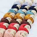 Stitch & story's lil' Merino 100% merino wool yarn is lined up in 3s, in their own colours.