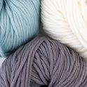 100% merino wool, Stitch & Story's Lil' Merino yarn in colour group, showing a close up of soft Teal, Bright White and Pebble Grey