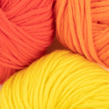100% merino wool, Stitch & Story's Lil' Merino yarn in colour group, showing a close up of Tulip Red, Dutch Orange and Sherbet Yellow