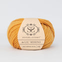 Front on shot of Stitch & story's 100% merino wool Lil' Merino's Sand Gold