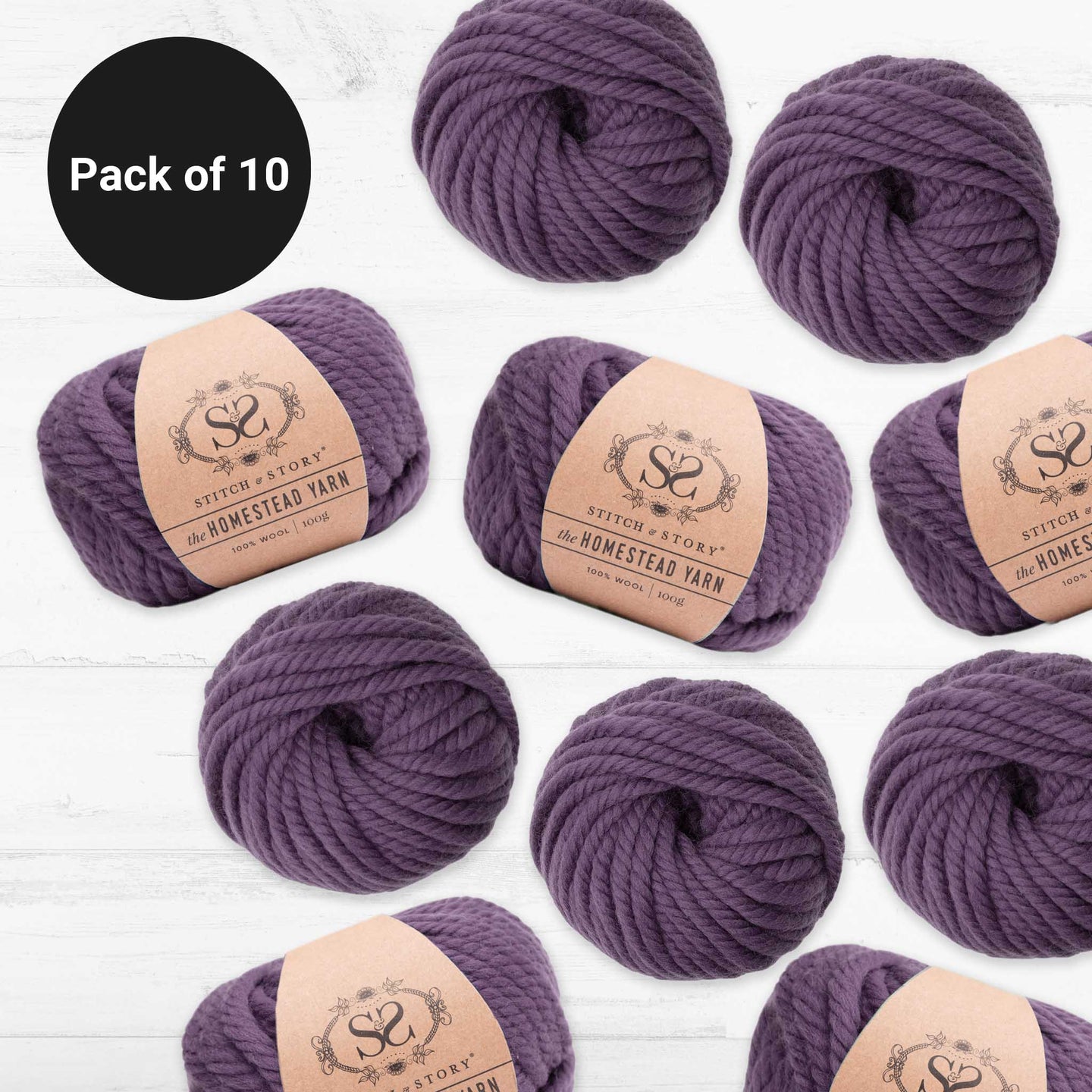 10 balls of Misty Lavender, 100% Wool Super Chunky Homestead Yarn from Stitch & Story is graphically placed on this image, with a black emblem saying 'Pack of 10' in the top left corner