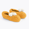 Mustard Yellow lola pom slippers with white pom pom knitted from Stitch & Story beginner knitting kit